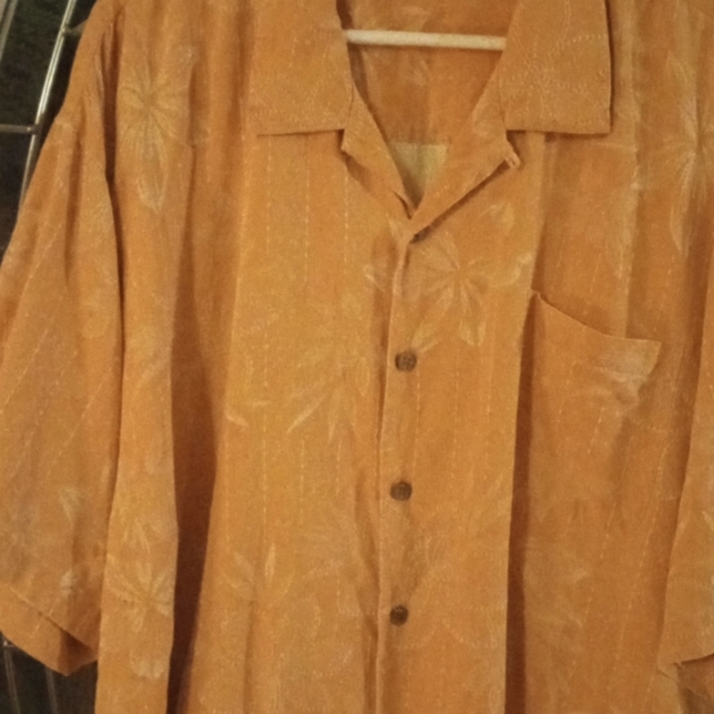 Tommy Bahama peach colored man's tropical shirt